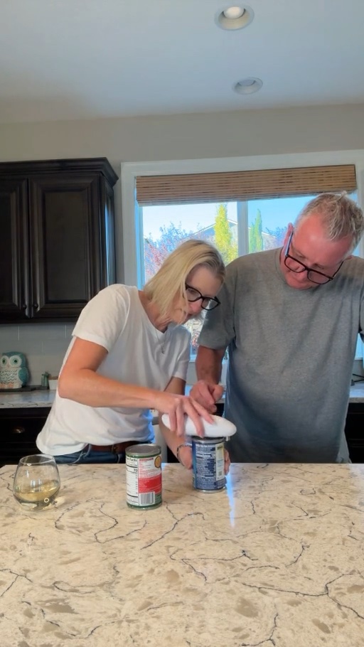 Kami and Sean testing the Kitchen Mama hands-free can opener